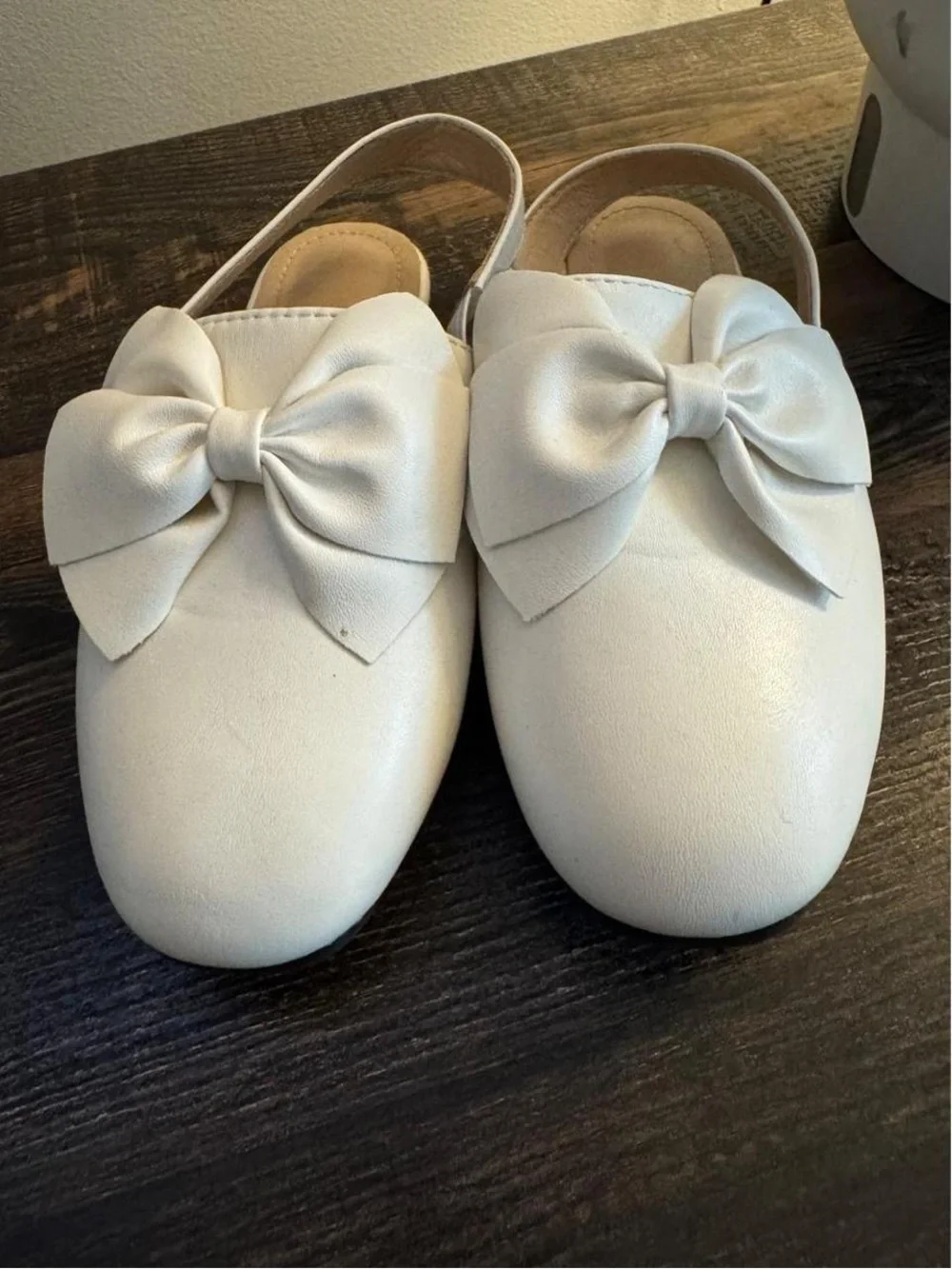 White Bow-Accent Kids Slip-On Shoes